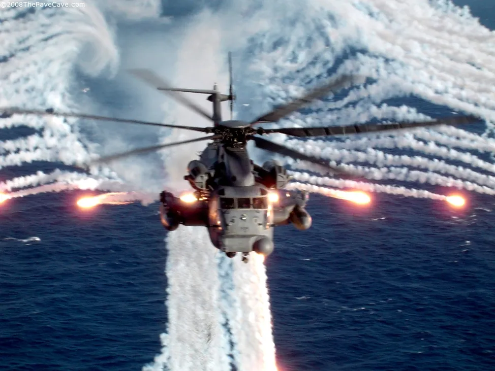 The same MH-53 PAVE LOW flare drop in its original daylight color